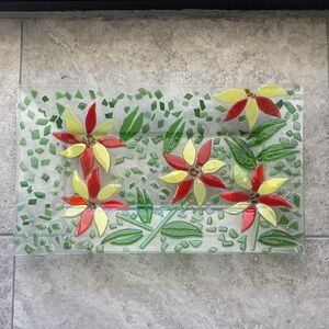 Multicolored floral mosaic footed glass tray.